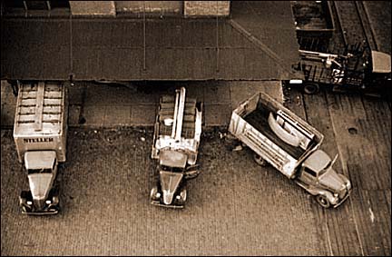 Minneapolis_Trucks loading at farm implement warehouse_01